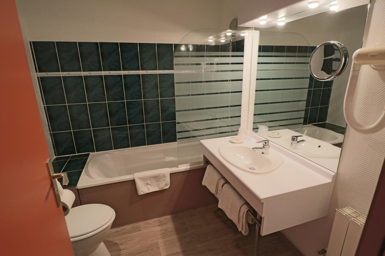 Logis-Hotel Des Oliviers Тьонвиль Экстерьер фото